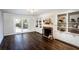 Living room with fireplace and hardwood floors at 7715 Ryefield Dr, Sandy Springs, GA 30350