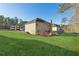 House with deck overlooking backyard at 3736 Busker Mill Ln, Ellenwood, GA 30294