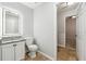 Bathroom with granite countertop and tiled floor at 3736 Busker Mill Ln, Ellenwood, GA 30294