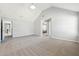 Spacious bedroom with vaulted ceiling and carpet at 3736 Busker Mill Ln, Ellenwood, GA 30294