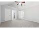 Spacious bedroom with vaulted ceiling and carpet at 3736 Busker Mill Ln, Ellenwood, GA 30294