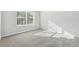 Bright bedroom with neutral wall and carpet at 3736 Busker Mill Ln, Ellenwood, GA 30294