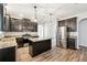 Modern kitchen with granite countertops and dark cabinetry at 3736 Busker Mill Ln, Ellenwood, GA 30294