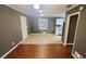 Open dining area with wood-look floors and kitchen access at 3873 Jane Marie Ln, Decatur, GA 30035