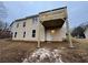 Tan house exterior with elevated deck and backyard at 108 Legend Creek Dr, Canton, GA 30114