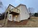 Tan house exterior with elevated deck and backyard at 108 Legend Creek Dr, Canton, GA 30114