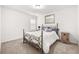 Bright bedroom with metal bed frame and window at 91 N. Harris St, Buford, GA 30518