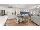 Kitchen features a dining area with a farmhouse table at 91 Harris St, Buford, GA 30518