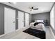 Bedroom with grey walls, hardwood floors and ceiling fan at 2007 North Nw Ave, Atlanta, GA 30318