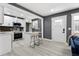 Modern kitchen with white shaker cabinets, stainless steel appliances, and an island at 2007 North Nw Ave, Atlanta, GA 30318