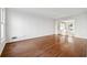 Hardwood floor living room with built-in shelving and natural light at 3182 Henderson Walk, Atlanta, GA 30340