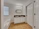 Main bathroom with double vanity and tile flooring at 129 Baywood Xing, Hiram, GA 30141