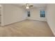 Spacious carpeted bedroom with two windows at 129 Baywood Xing, Hiram, GA 30141