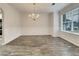 Bright dining room with chandelier and wainscoting at 129 Baywood Xing, Hiram, GA 30141