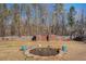 Backyard with pond, shed, and wooded area at 45 Kendall Ln, Covington, GA 30014