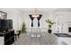 Dining area with glass table and patterned floor at 45 Kendall Ln, Covington, GA 30014