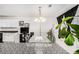 Dining area with glass table and patterned floor at 45 Kendall Ln, Covington, GA 30014