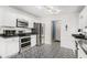 Modern kitchen with stainless steel appliances at 45 Kendall Ln, Covington, GA 30014