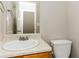 Small bathroom with single sink vanity and toilet at 4905 Bridle Point Pkwy, Snellville, GA 30039