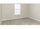 Simple bedroom with neutral walls and carpeting at 4905 Bridle Point Pkwy, Snellville, GA 30039