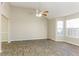 Spacious living room with tile floors and large windows at 4905 Bridle Point Pkwy, Snellville, GA 30039