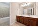 Double vanity bathroom with a separate tub and shower at 4705 Sanderling St, Cumming, GA 30041