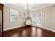 Bright dining area with hardwood floors and an egg chair at 4705 Sanderling St, Cumming, GA 30041