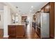 Modern kitchen with stainless steel appliances and hardwood floors at 4705 Sanderling St, Cumming, GA 30041