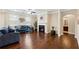 Living room with hardwood floors, fireplace, and built-ins at 4705 Sanderling St, Cumming, GA 30041