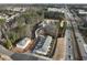 Aerial view of townhomes near a roadway, showcasing new construction at 747 Trevett Way, Marietta, GA 30062