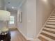 Light and airy entryway with stairs and view to front door at 747 Trevett Way, Marietta, GA 30062