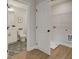 Laundry room with built-in shelving and vinyl plank flooring at 747 Trevett Way, Marietta, GA 30062