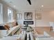 Bright living room featuring a neutral color palette and cozy seating at 747 Trevett Way, Marietta, GA 30062