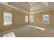 Spacious main bedroom with high ceilings and multiple windows at 216 Chad Ln, Loganville, GA 30052