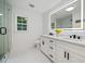 Modern bathroom with a double vanity, quartz countertop, and glass shower at 2950 Loring Nw Rd, Kennesaw, GA 30152