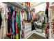Spacious walk-in closet features custom shelving and racks for clothes and accessories at 3430 Summerpoint Xing, Cumming, GA 30028