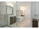 Modern bathroom with double sinks, soaking tub, and walk-in shower at 18 Peachtree Ne Ave # 1, Atlanta, GA 30305