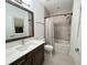 Clean bathroom with shower/tub combo and single vanity at 18 Peachtree Ne Ave # 1, Atlanta, GA 30305