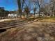 Aerial perspective of new townhomes nestled amongst trees at 3430 Holly Springs Pkwy, Canton, GA 30115