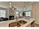 Modern kitchen with double sink and stainless steel appliances at 2466 Honey Way, Conyers, GA 30013