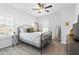 Spacious bedroom with a ceiling fan and large windows at 1 Ganel Ln, Alpharetta, GA 30009