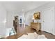 Upstairs hallway with hardwood floors, built-in dresser, and access to bedrooms at 1 Ganel Ln, Alpharetta, GA 30009