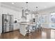 Modern kitchen with stainless steel appliances and breakfast bar at 1 Ganel Ln, Alpharetta, GA 30009