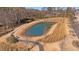 Serene pond with walking path and landscaping at 1 Ganel Ln, Alpharetta, GA 30009