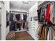 Spacious walk-in closet with ample shelving and hanging space at 1 Ganel Ln, Alpharetta, GA 30009