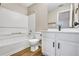 Clean bathroom with white cabinets and a shower/tub combo at 273 Devonshire Dr, Alpharetta, GA 30022