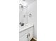 Bathroom boasts a white vanity with quartz countertop at 273 Devonshire Dr, Alpharetta, GA 30022