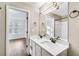 Double vanity bathroom with white cabinets and quartz countertops at 273 Devonshire Dr, Alpharetta, GA 30022