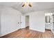 Bright bedroom with wood floors and an ensuite bathroom at 273 Devonshire Dr, Alpharetta, GA 30022