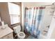 Bathroom with toilet, shower, and patterned shower curtain at 3155 Boldmere Se Trl # 3, Smyrna, GA 30080